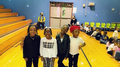Kindergarten students performing the poem "Hey Black Child" 