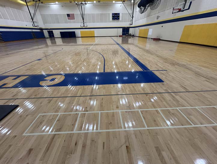 The gym floor in the auxiliary gym at Midland High School