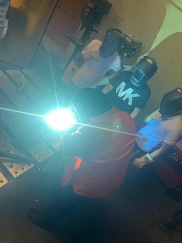 Welders working in the welding shop