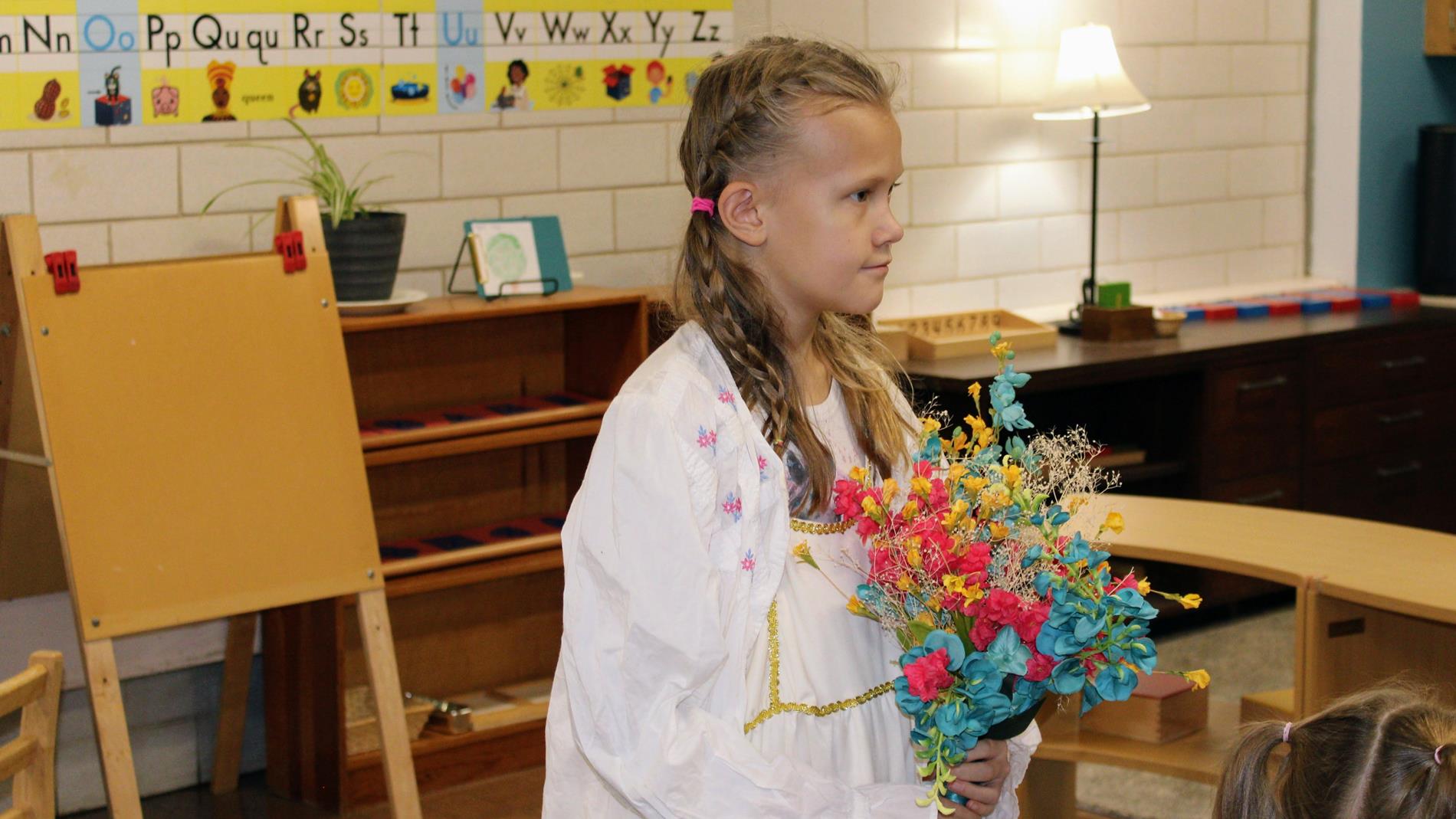 A child dressed as a saint