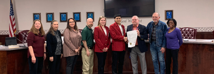 CTE Students and Sponsor give February is CTE Month  Governor's proclamation to Board