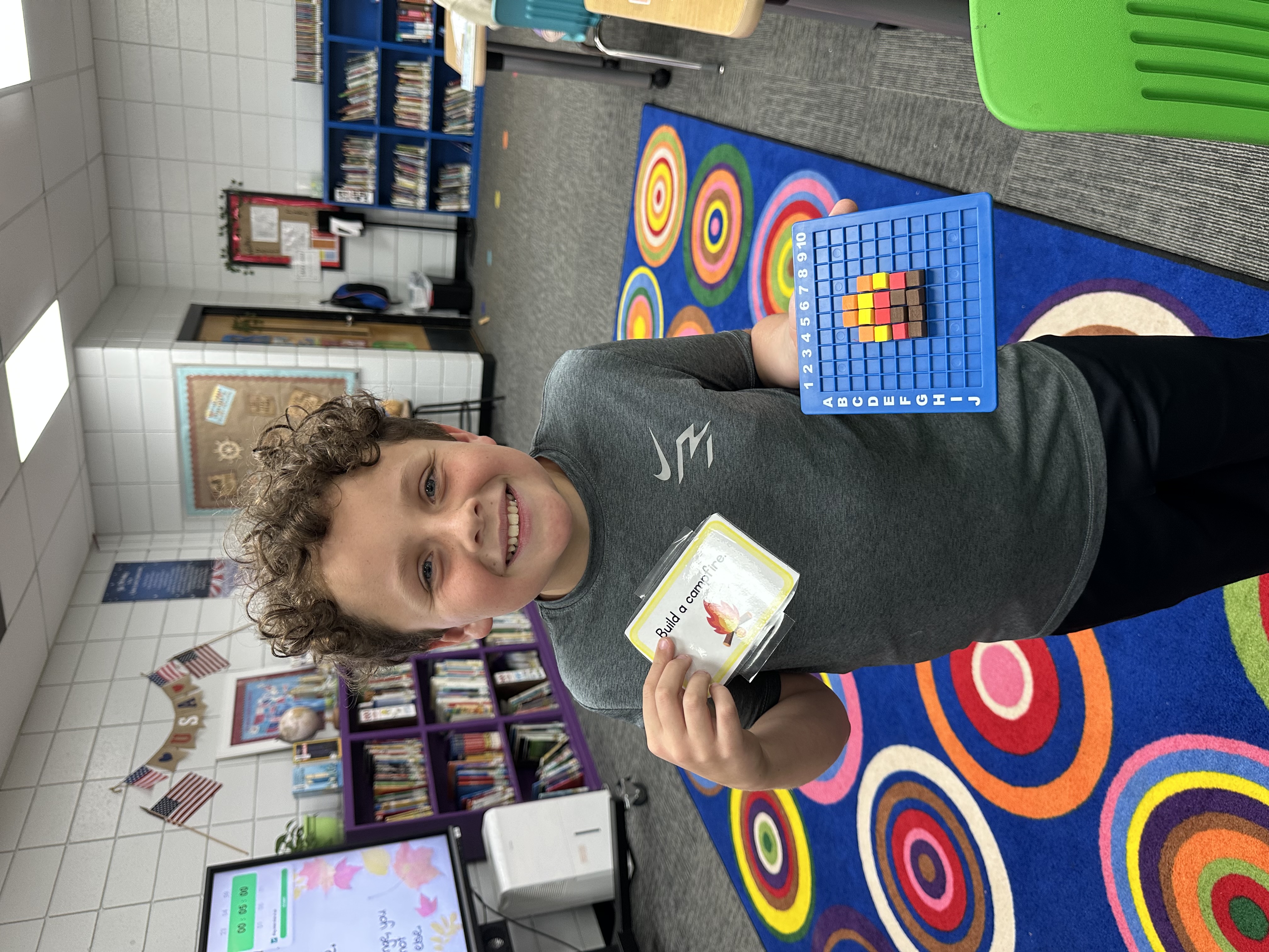 Student completed a building challenge and created a campfire using pixel art.