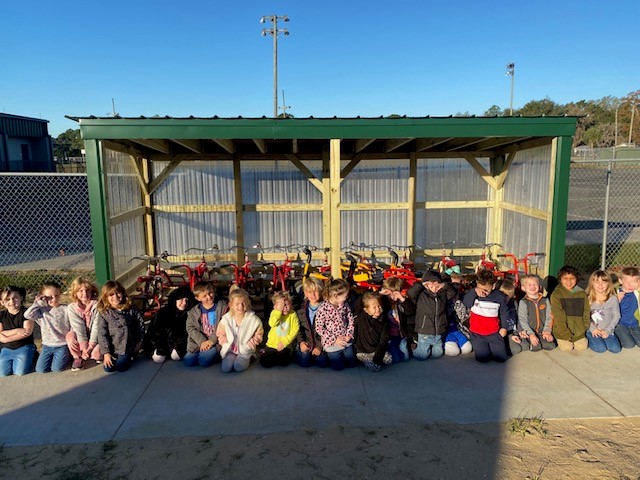 PreK Students with Tricycle track and garage