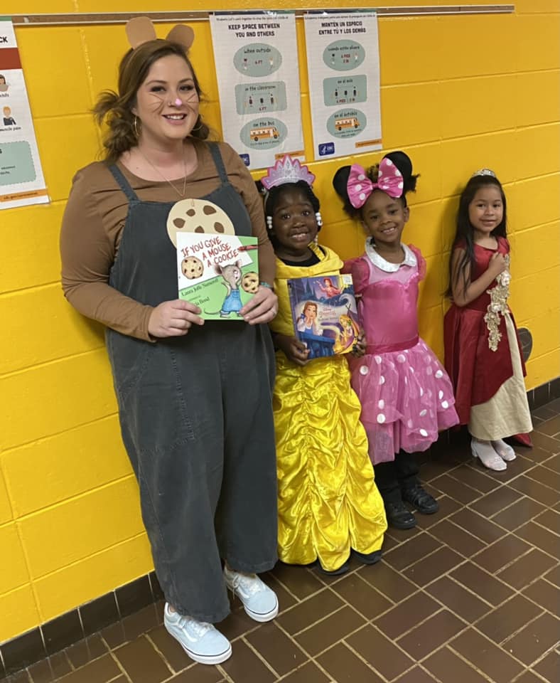 Kindergarten teacher and students who dressed up for book character day