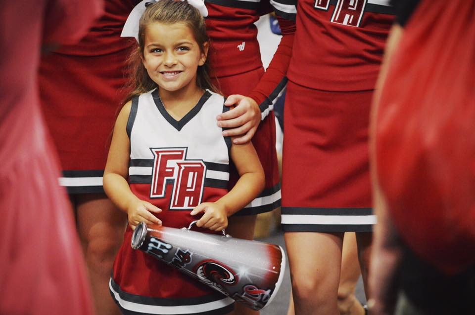 young cheerleader with megaphone