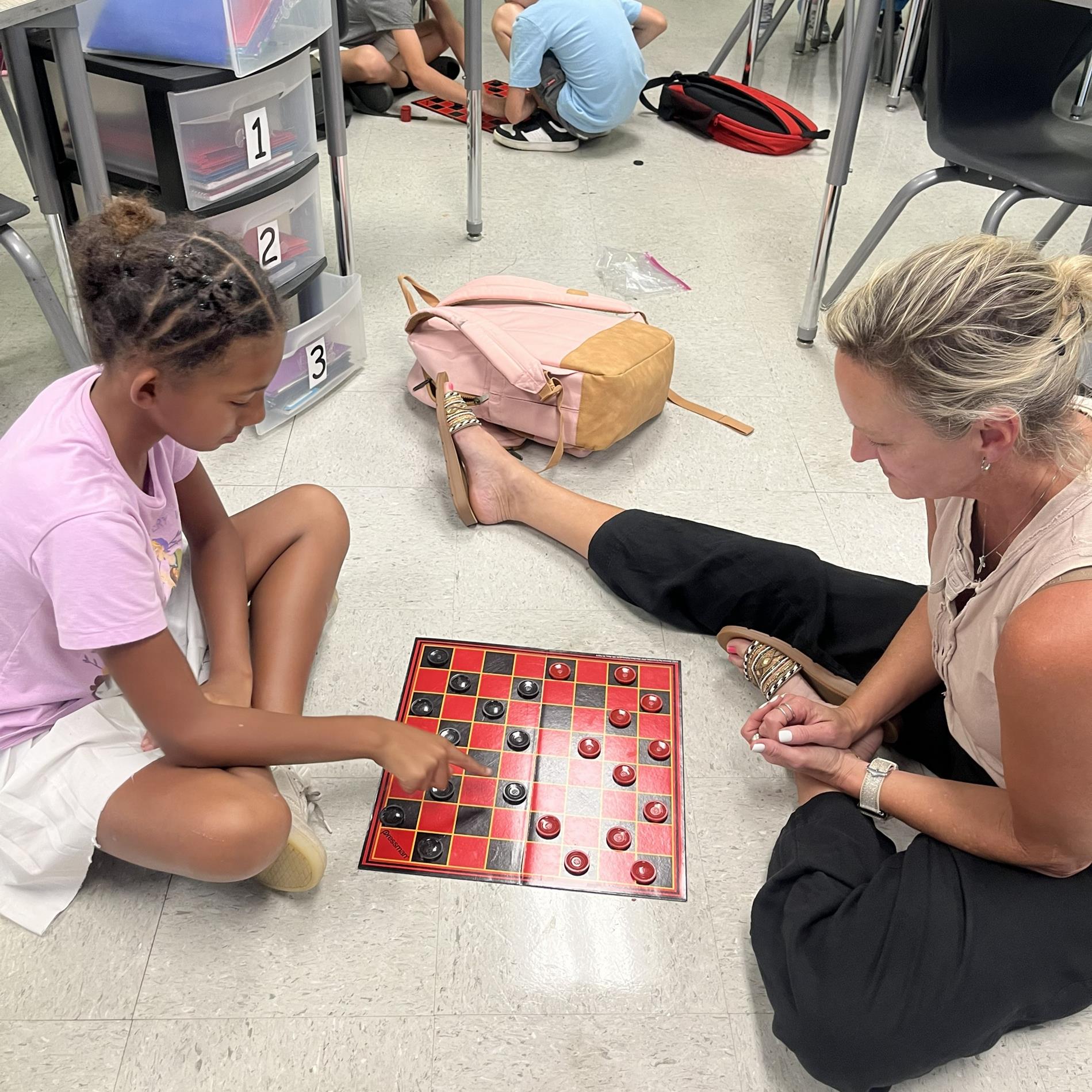 Teacher vs Student in checkers