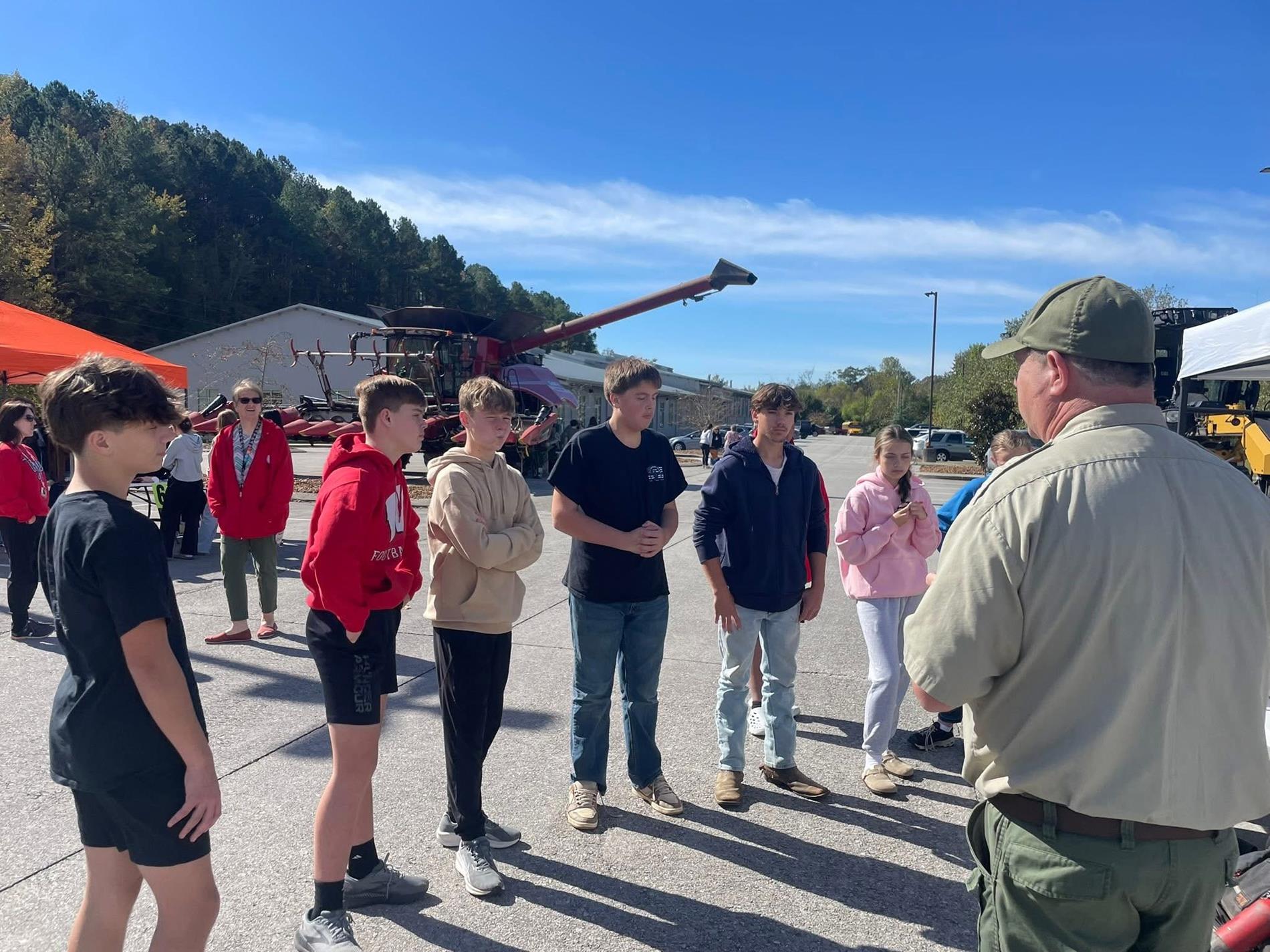 8th graders listen to speaker at UT Agriculture Day