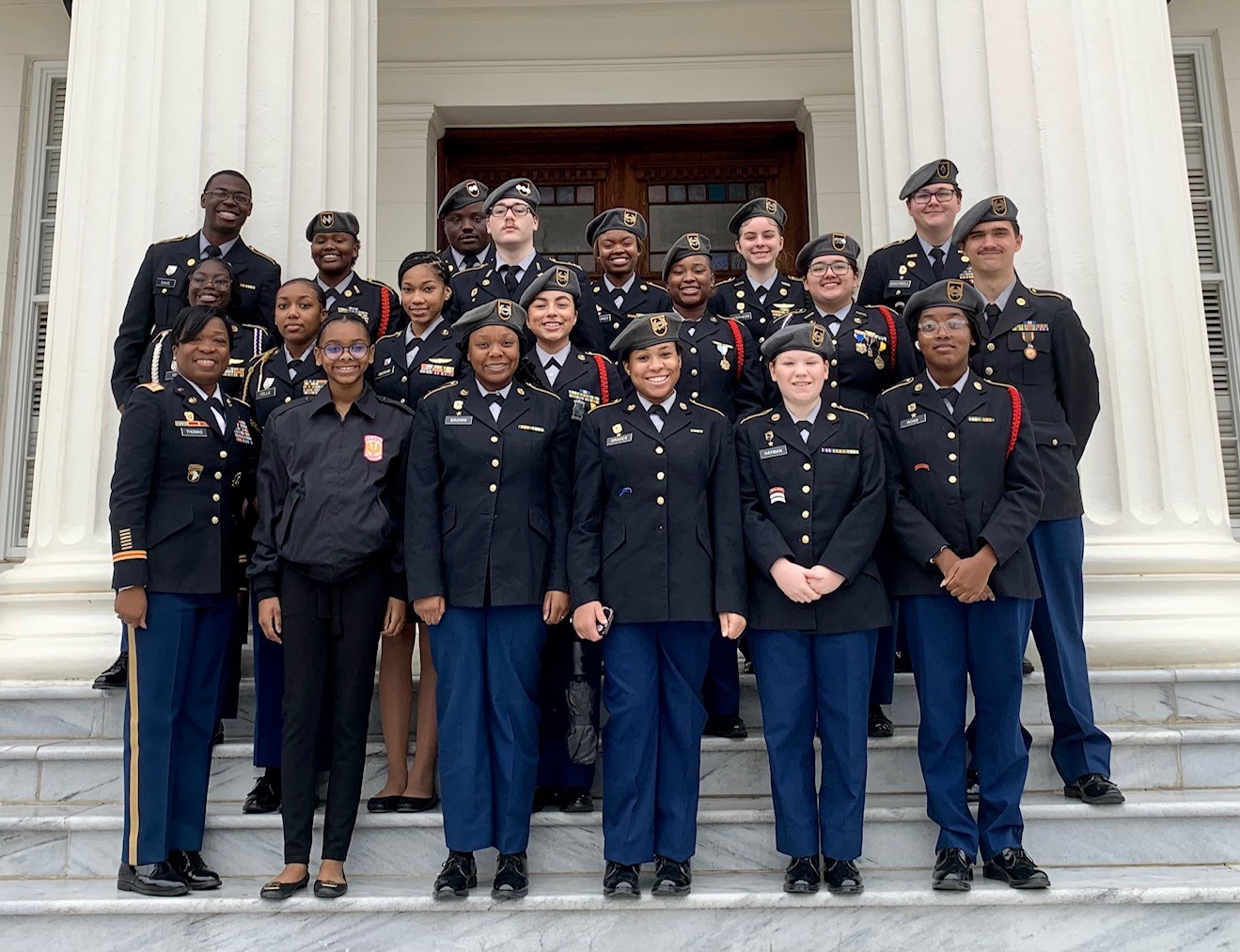Murphy and Blount High School JROTC cadets pose for a group photo on the steps of Alabama State Capitol for CTE on the Hill in Montgomery, AL