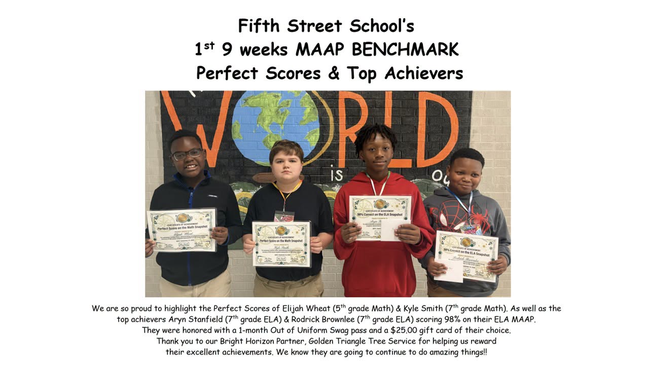 Four Fifth Street students stand together holding certificates recognizing perfect Math Snapshot scores and top ELA MAAP Benchmark achievement.