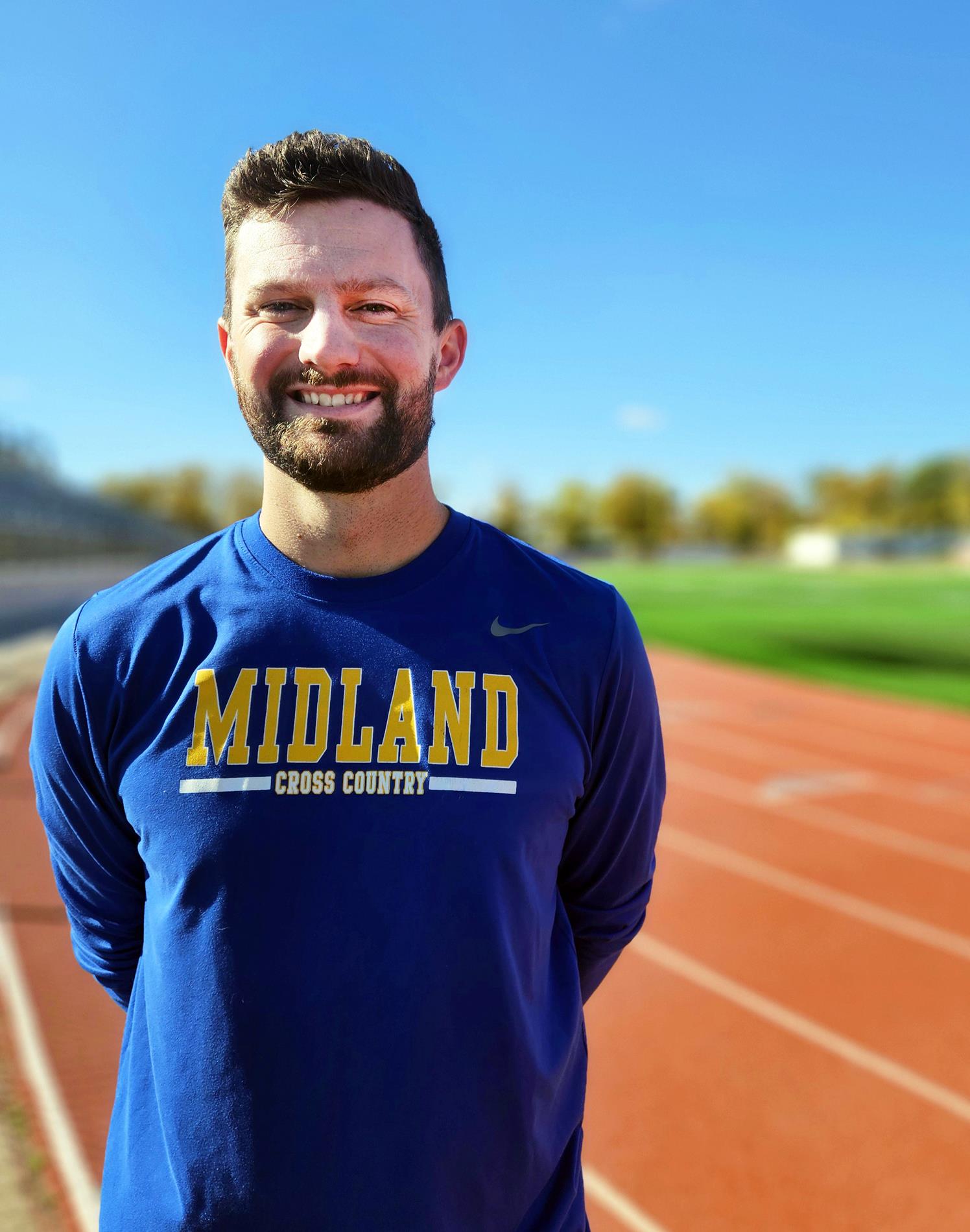 Midland High teacher and coach Andrew Plude Midland High teacher and coach Andrew Plude