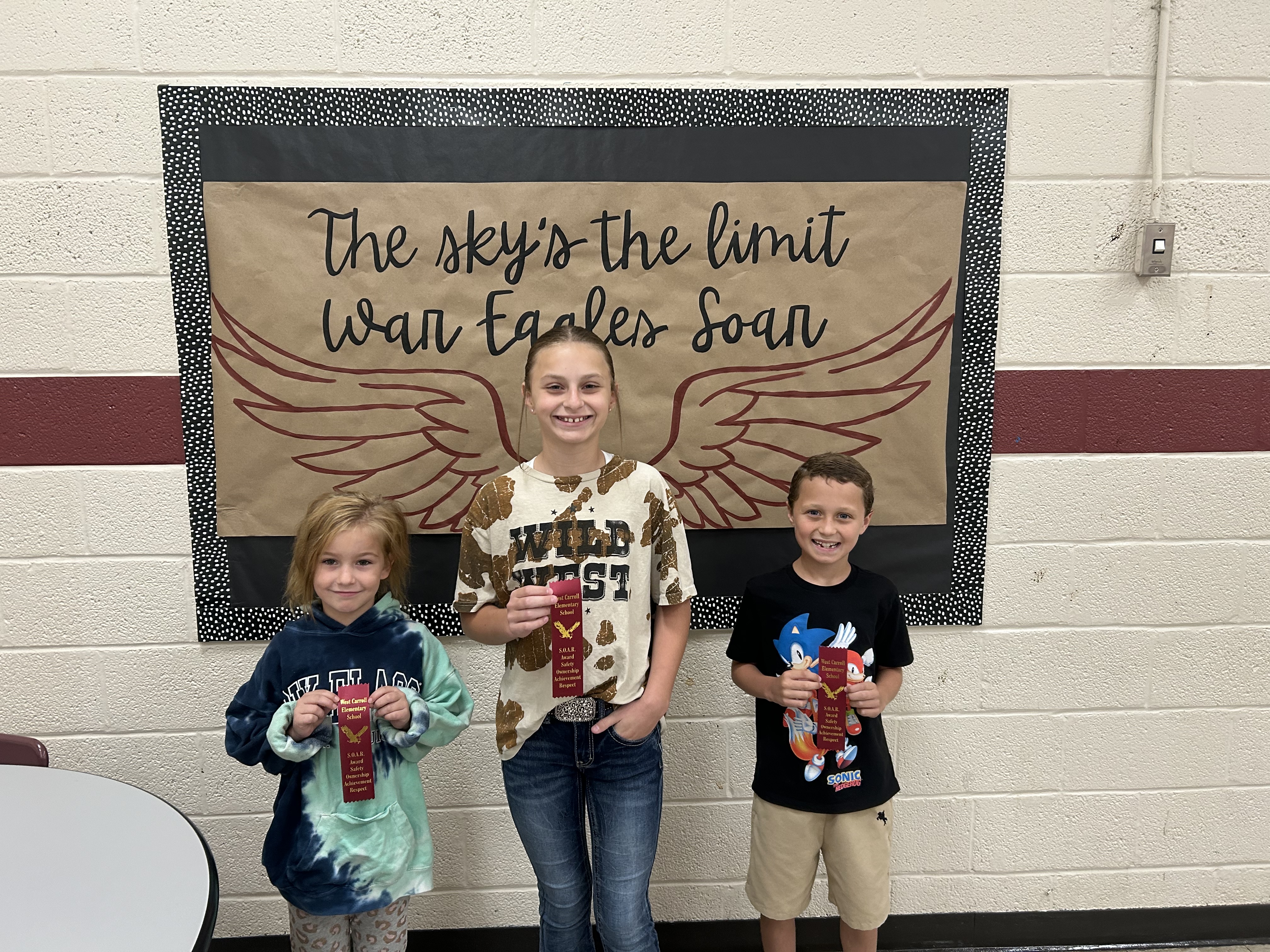 from left Martin, Hollowell, and Ulrich, students the sky is the limit eagles soar awards