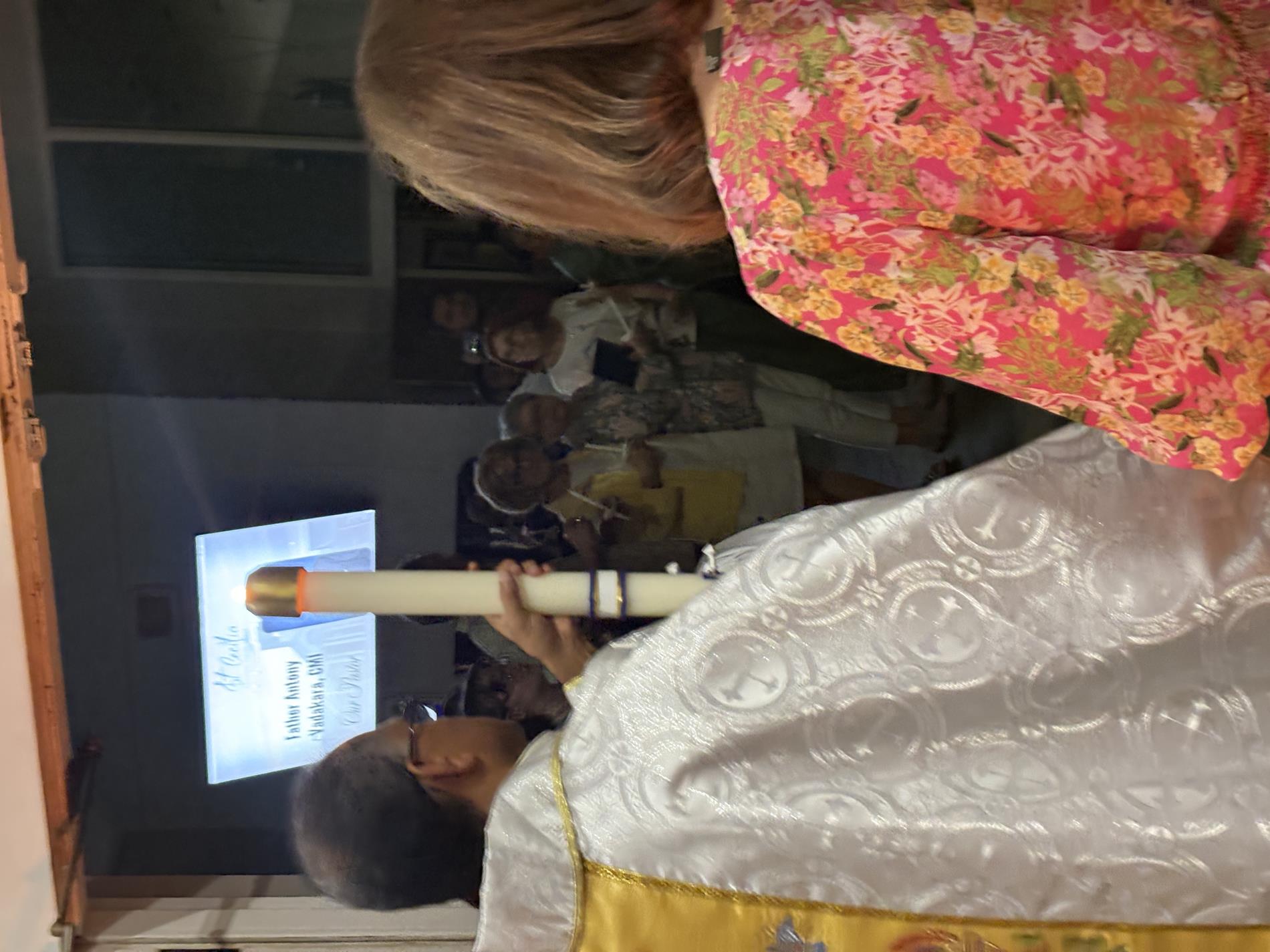 Procession into the dark church begins