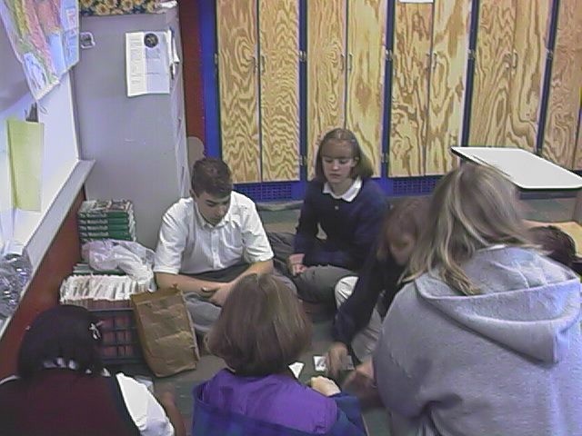 Students counting paperclips