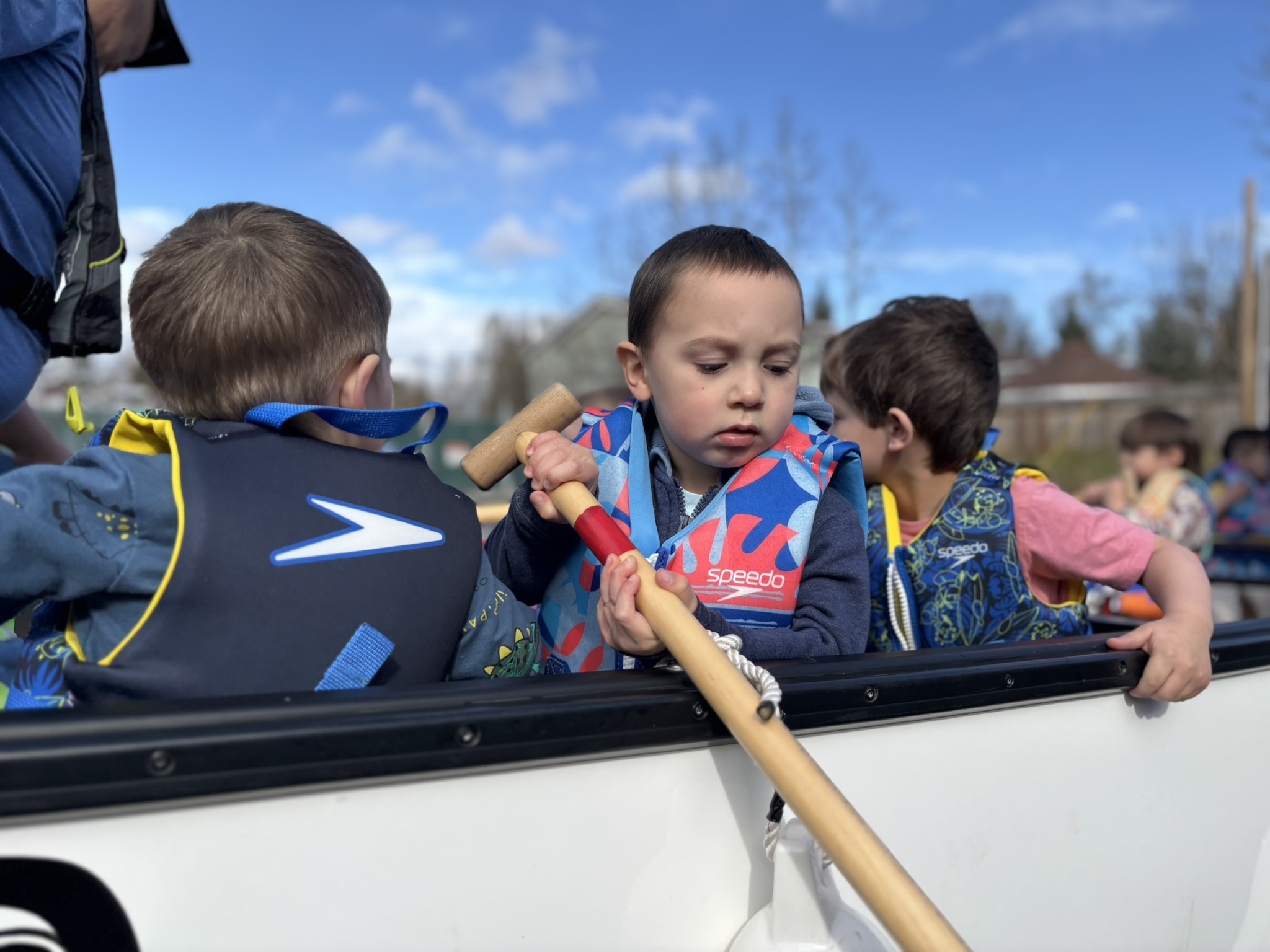 student in canoe