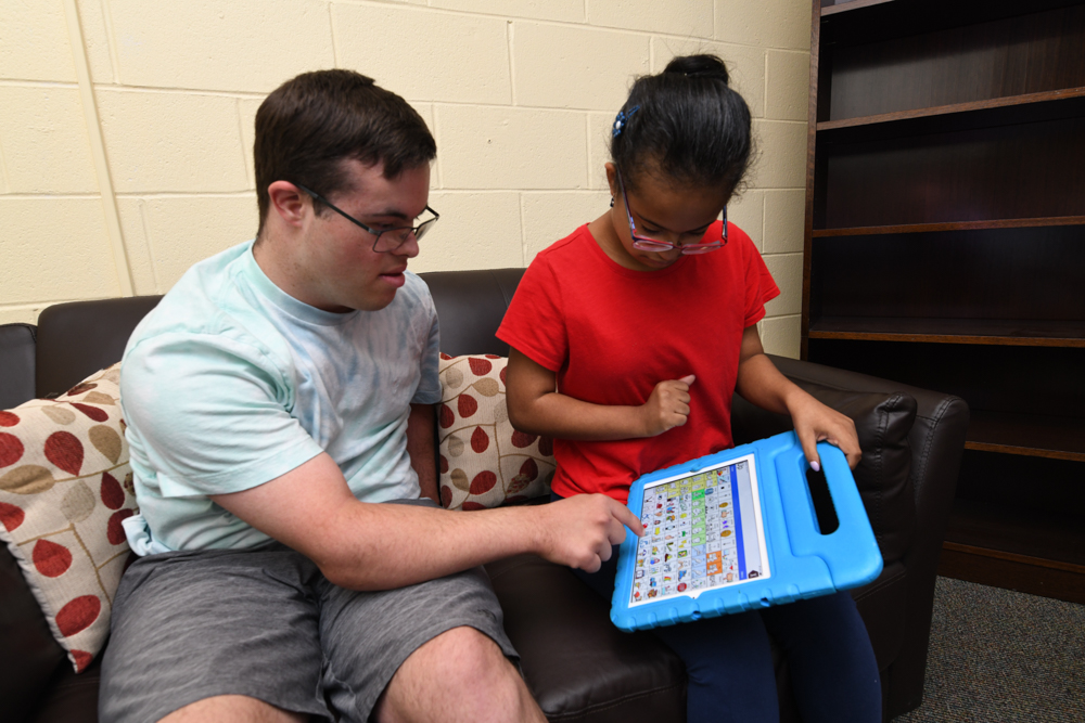 students using AAC device