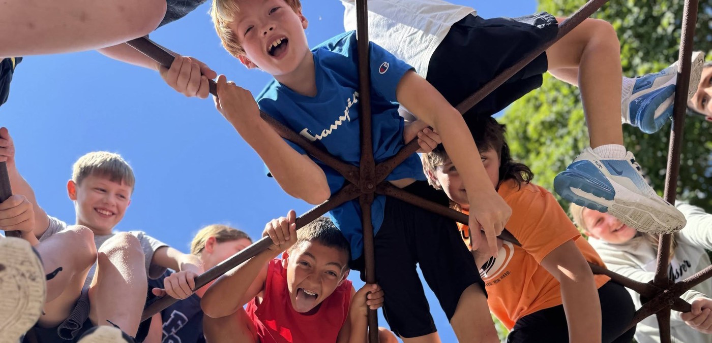 Elementary students on the jungle gym.