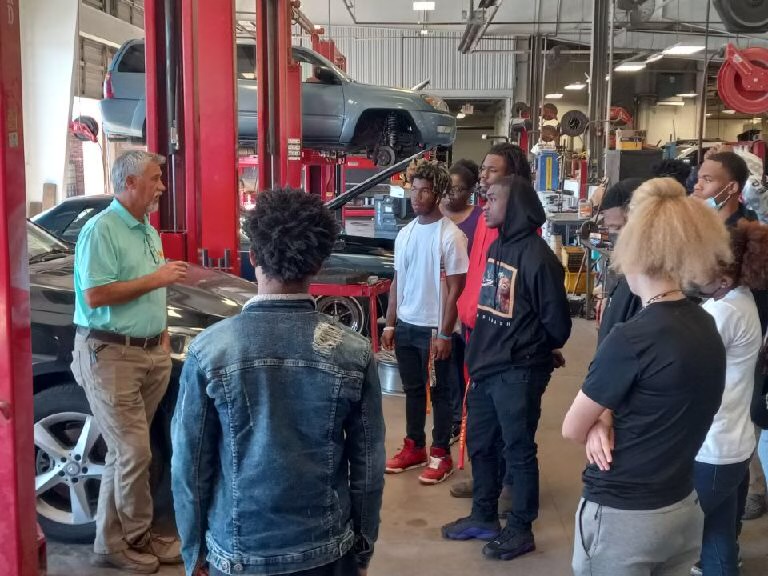 Collision Repair Students viewing auto body work 