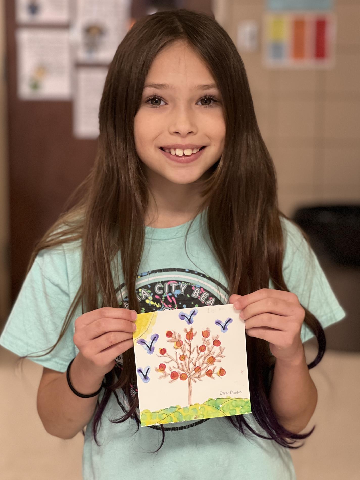 student with artwork