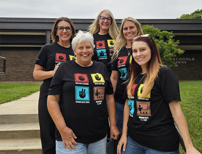 A group of Special Services team members pose with Superintendent Miller-Nelson and Associate Superintendent Kara Stark in matching t-shirts