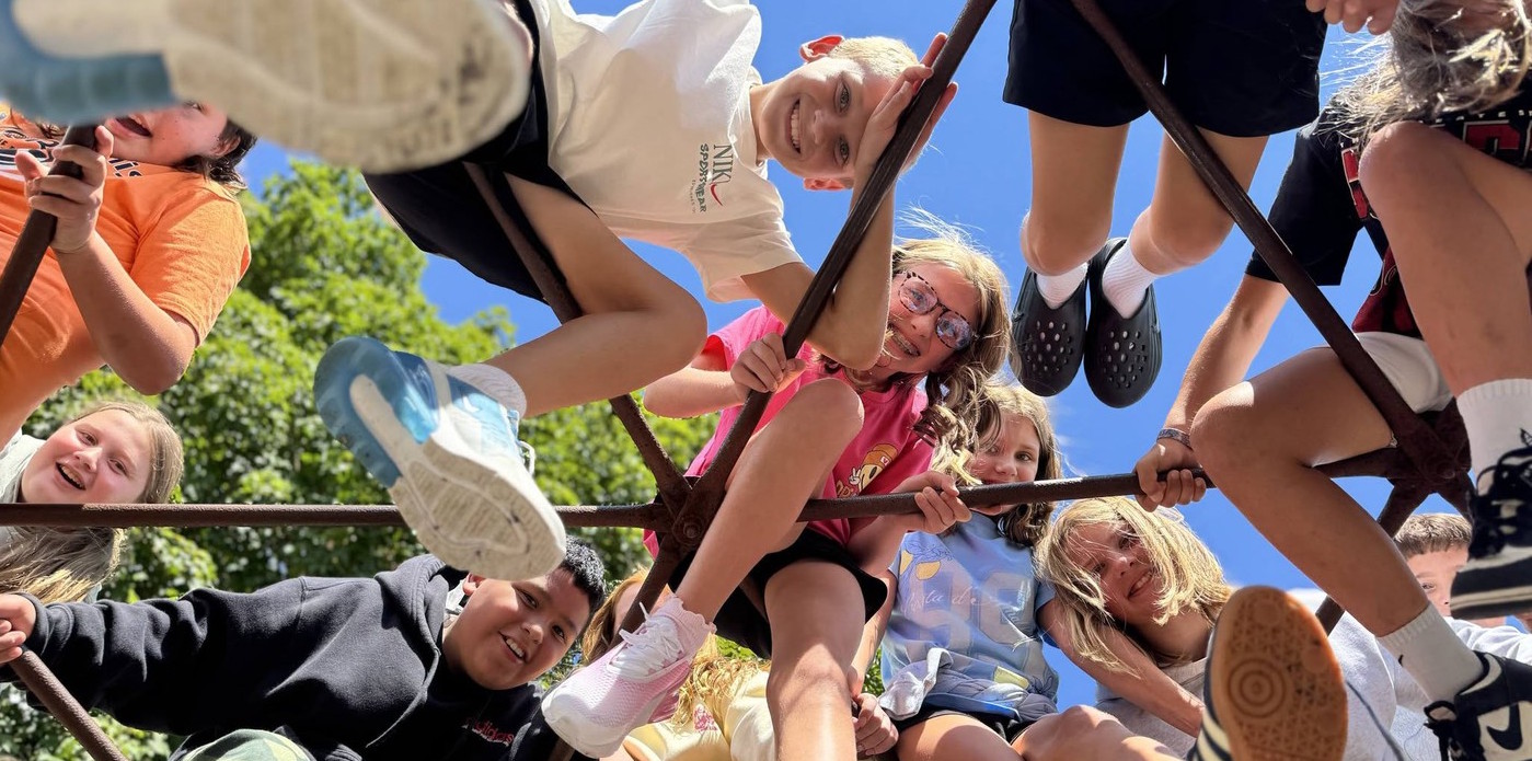 Elementary students on the jungle gym.