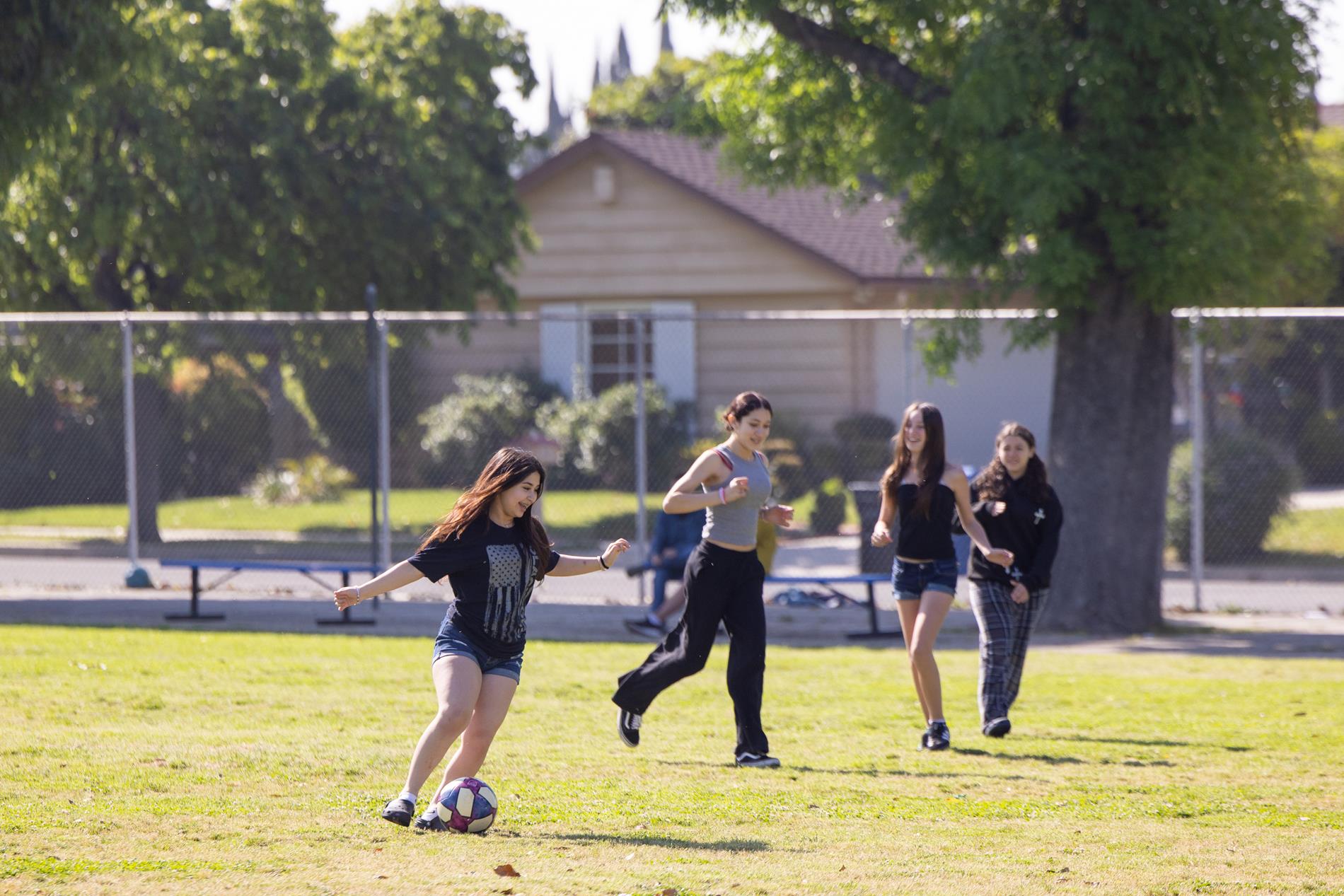 Students playing soccer