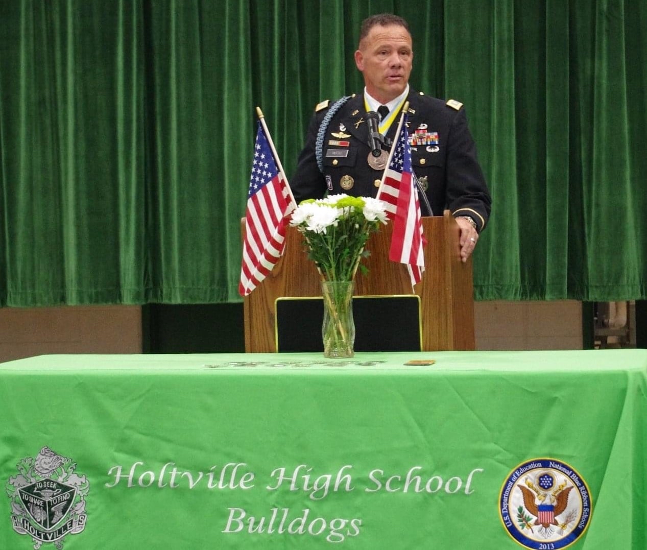 MAJ Hutto speaking at the Holtville High School Military Enlistment Celebration.  