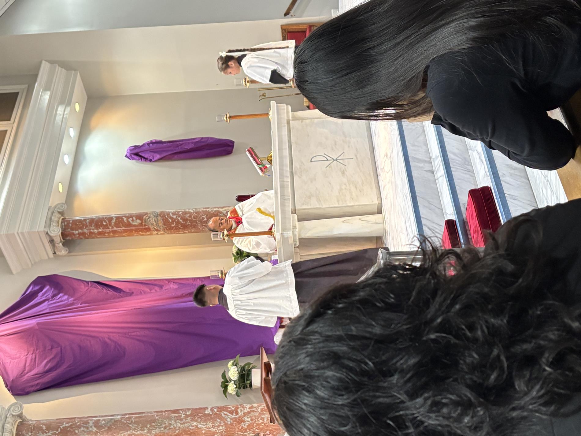 Eucharist is brought in from the Altar of Repose