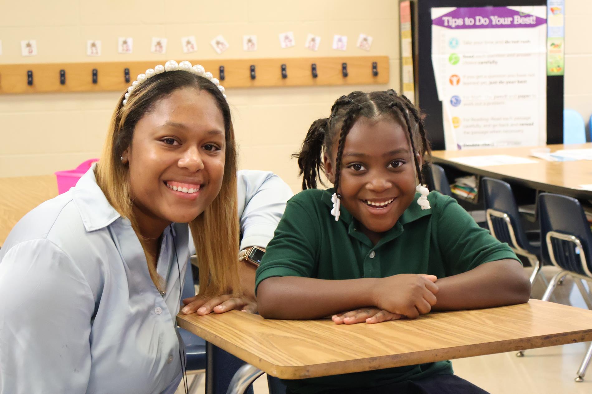 Teacher and student in class