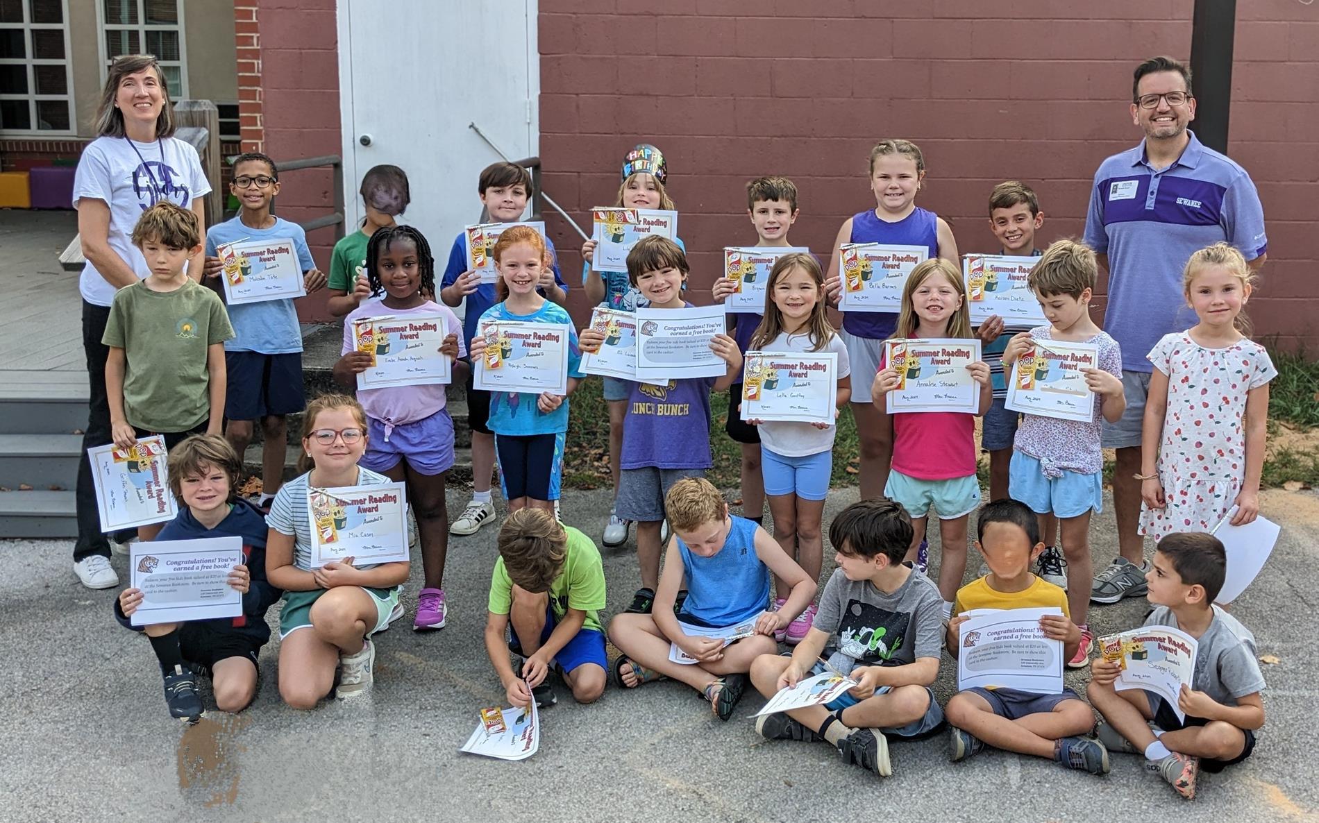 group of kids with certificates