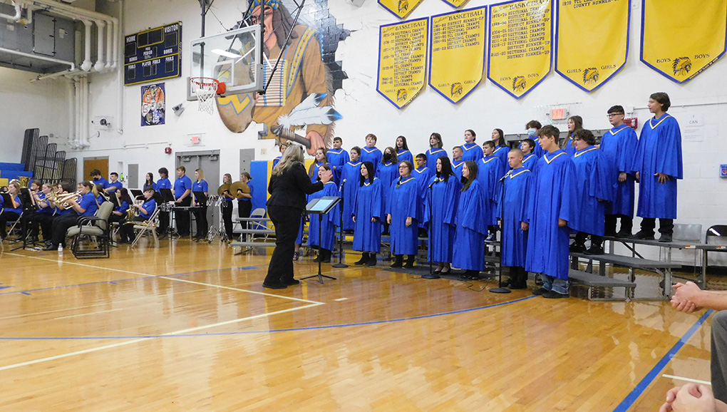 Choir and Band preform the military branches songs