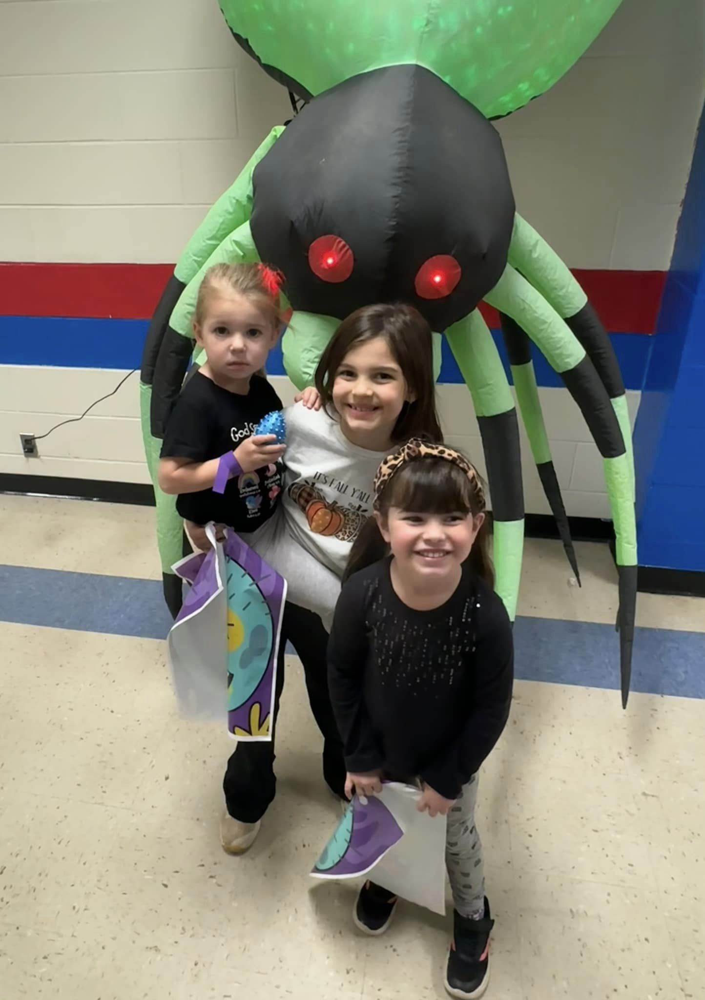 kids with blow up spider