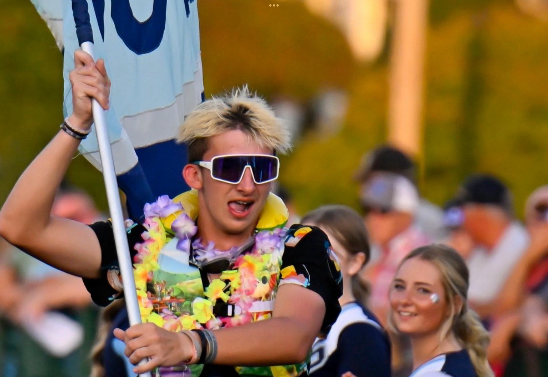 Student running flag