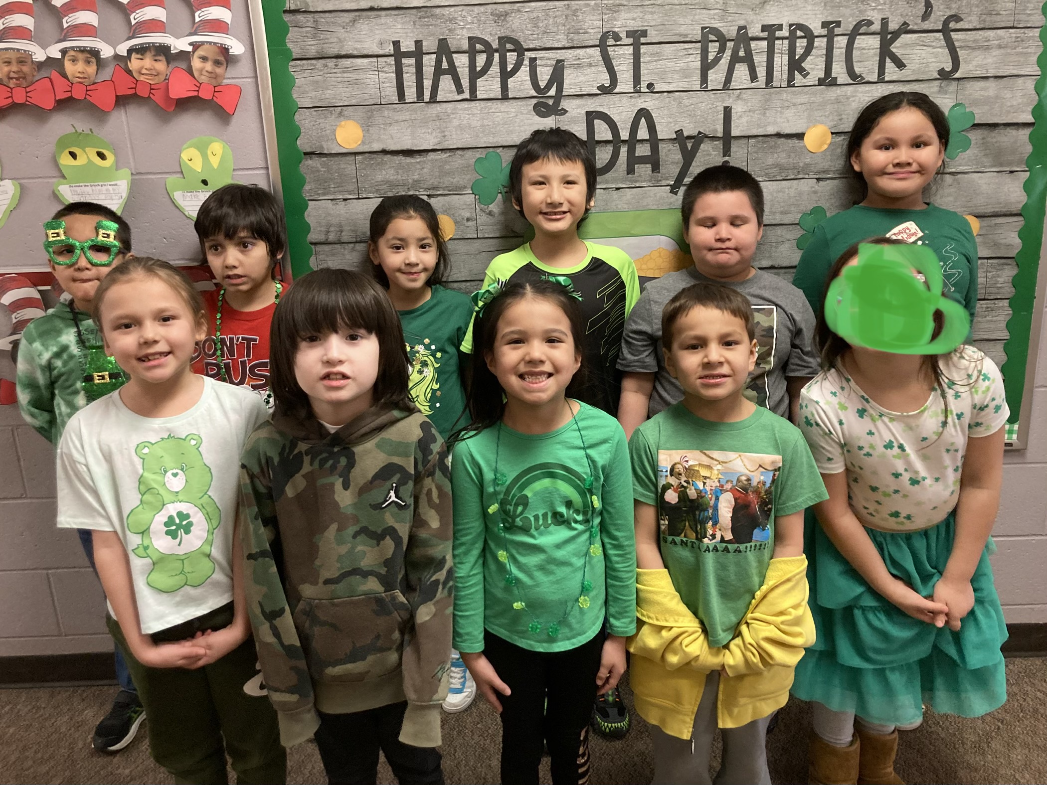 Group 1 of Elementary Students wearing St. Patrick's Day shirts
