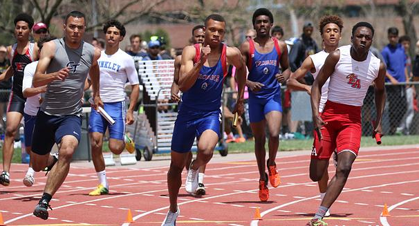 young men running track