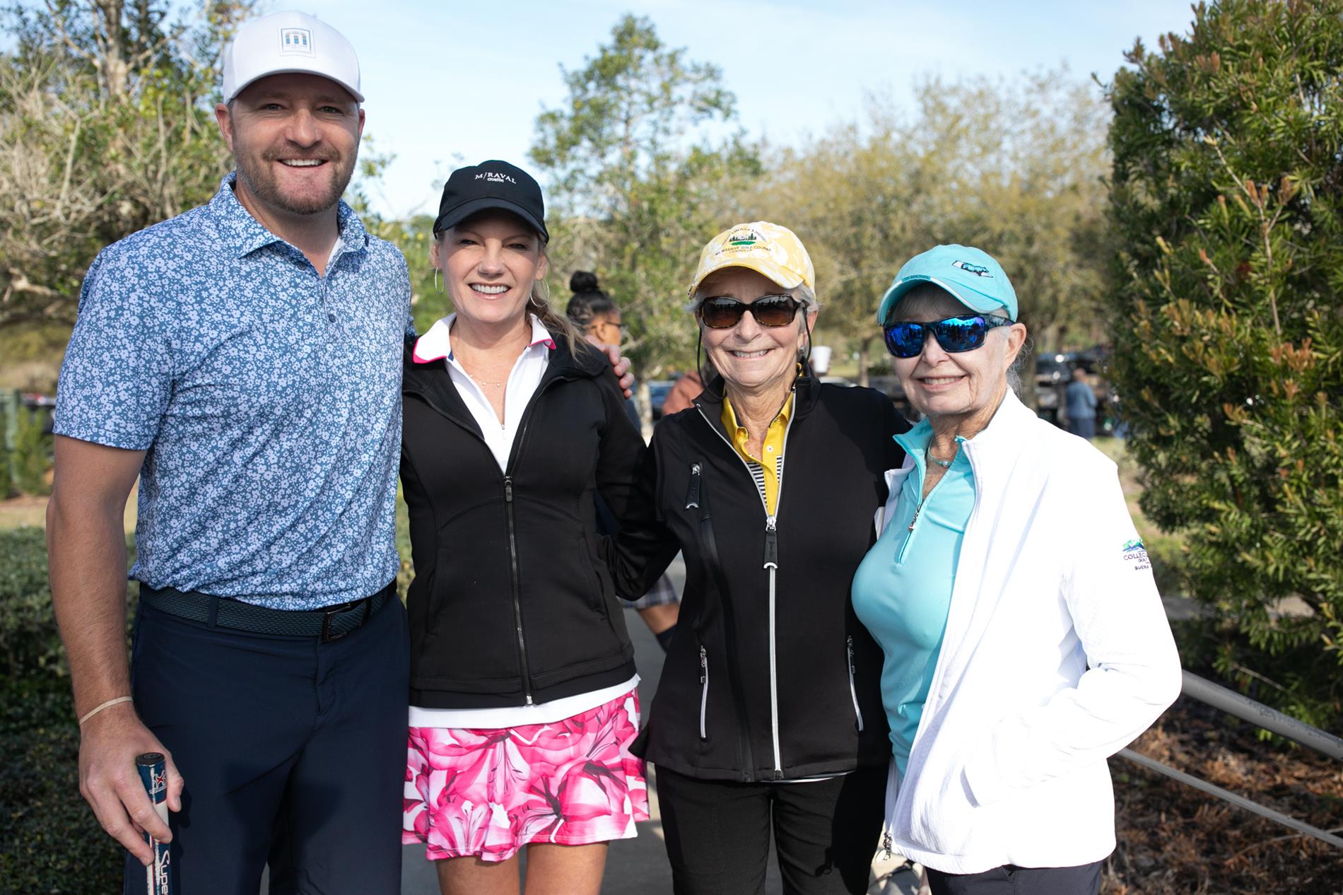 Josh Scobee with women golfers