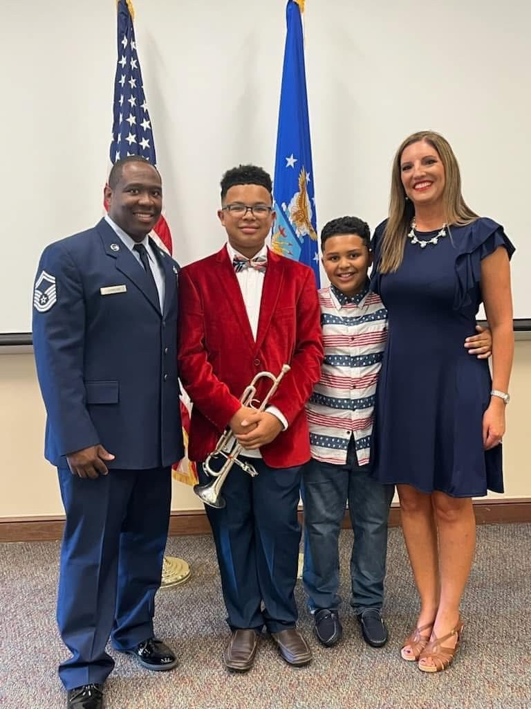 Melissa Johnson with family. Husband and 2 kids