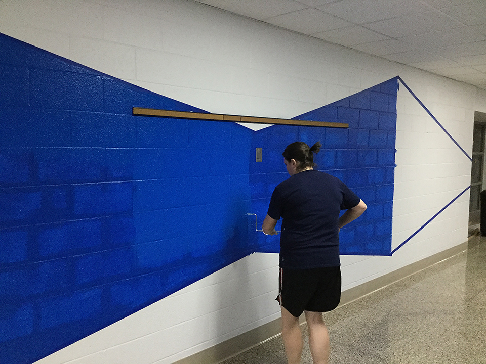 Staff painting the halls