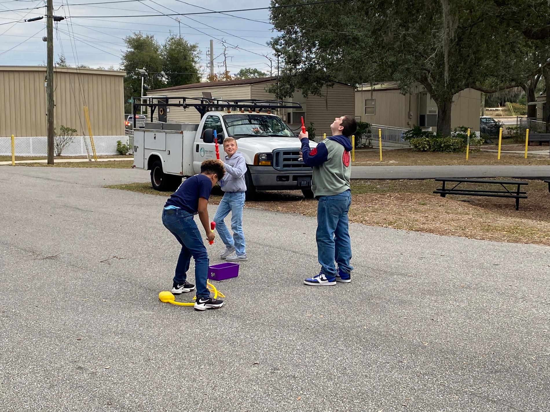 5th grade students using the Stomp Rockets to explore force and motion.
