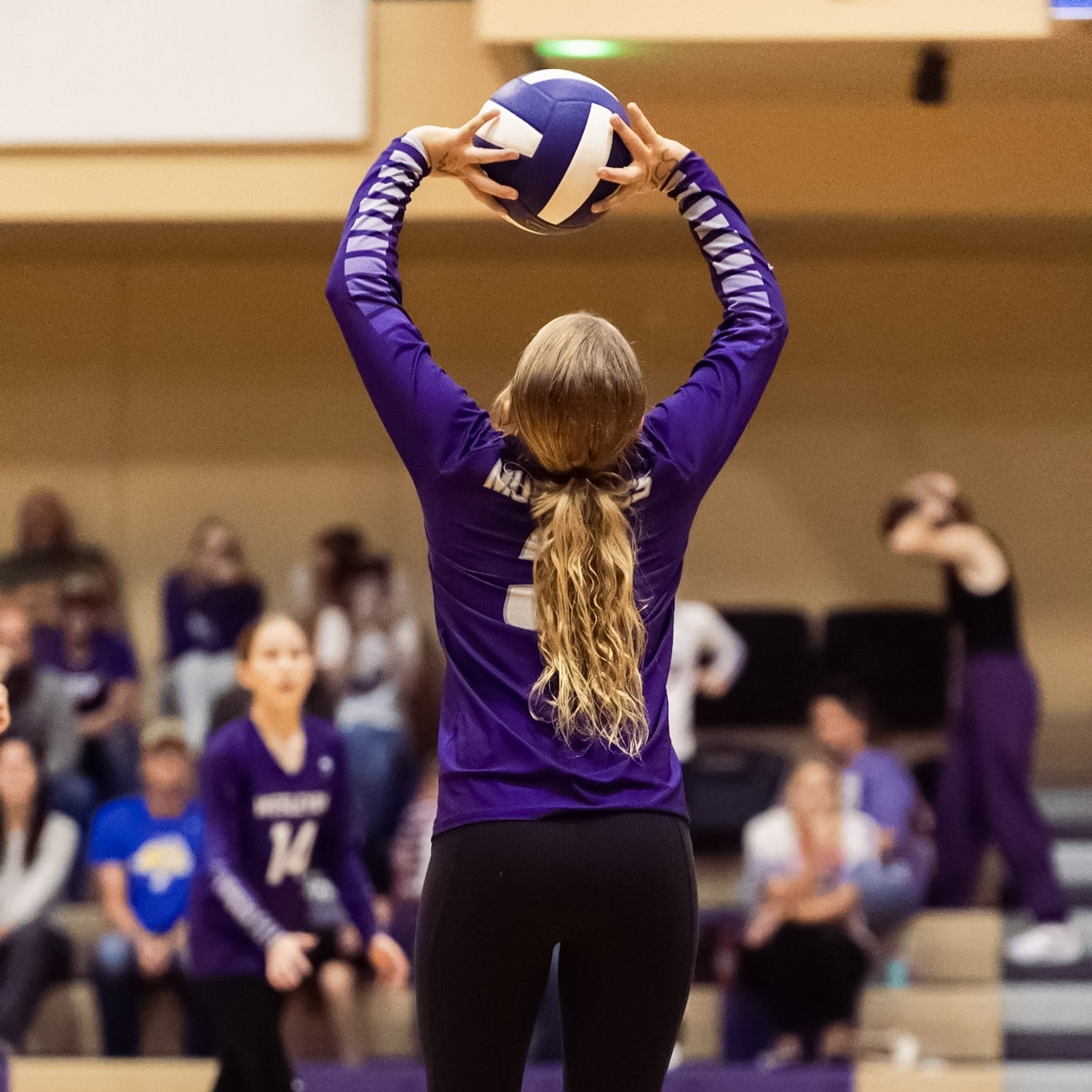 Student Playing Volleyball