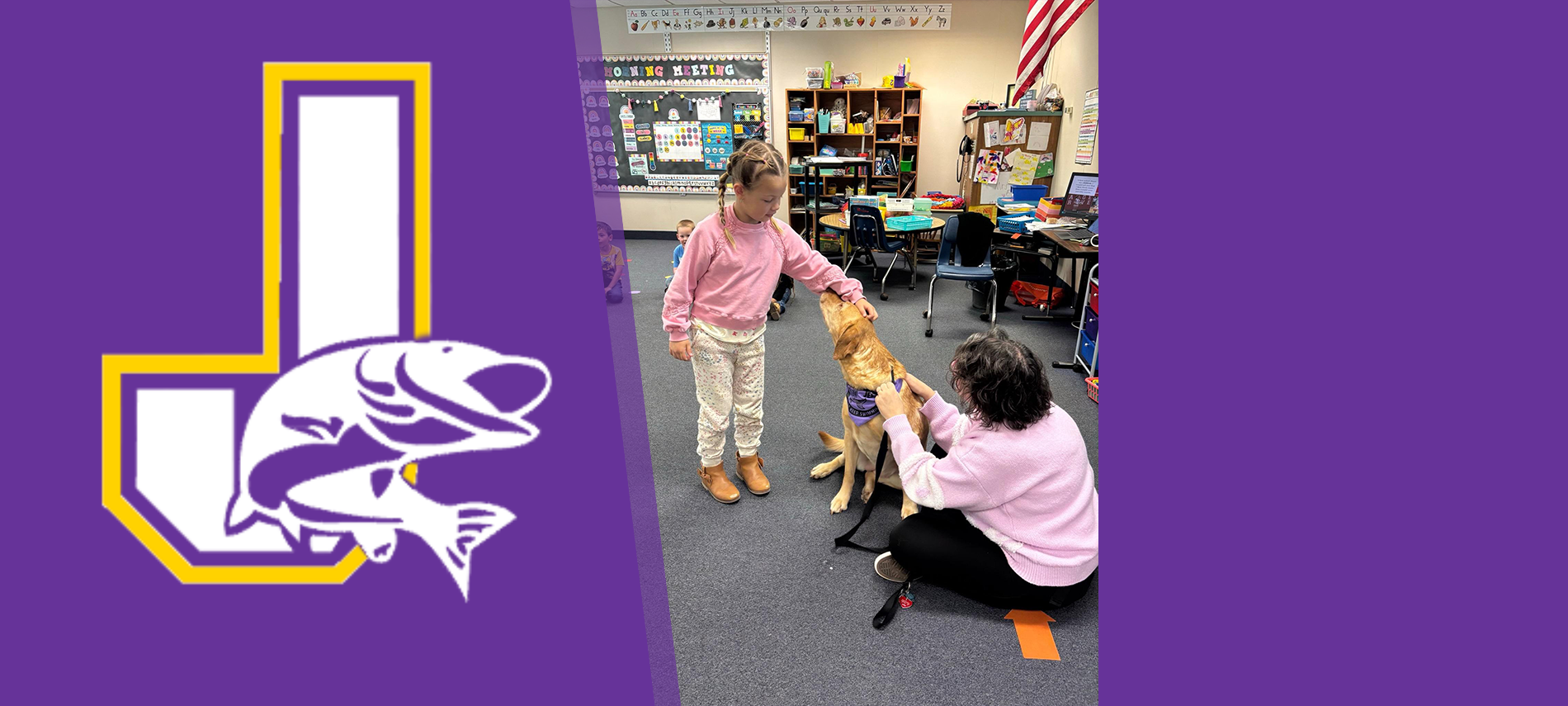 Winnie the service dog interacting with students