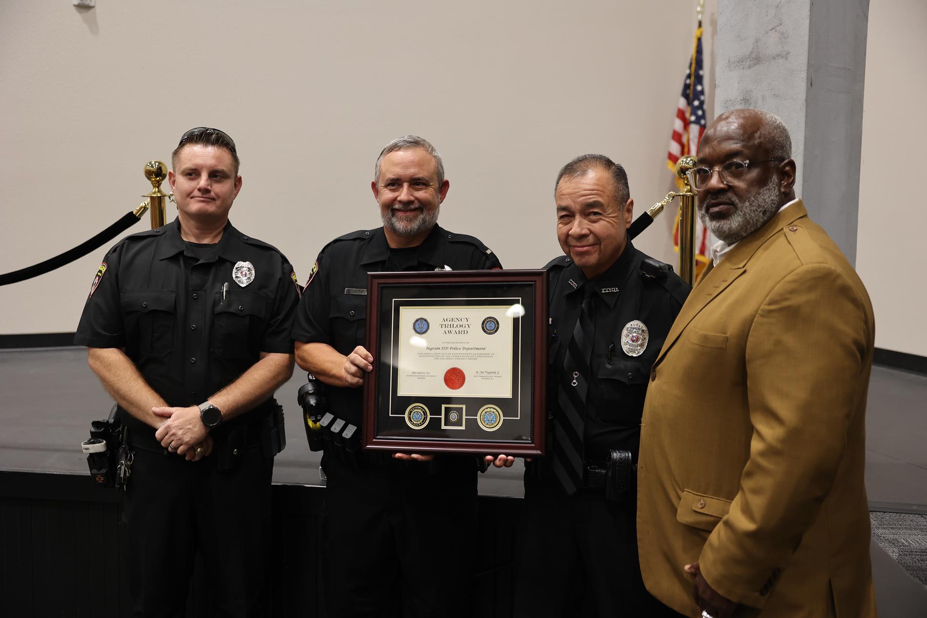 Ingram ISD Police Chief Eli Garcia accepted the award during the September board of trustees meeting 