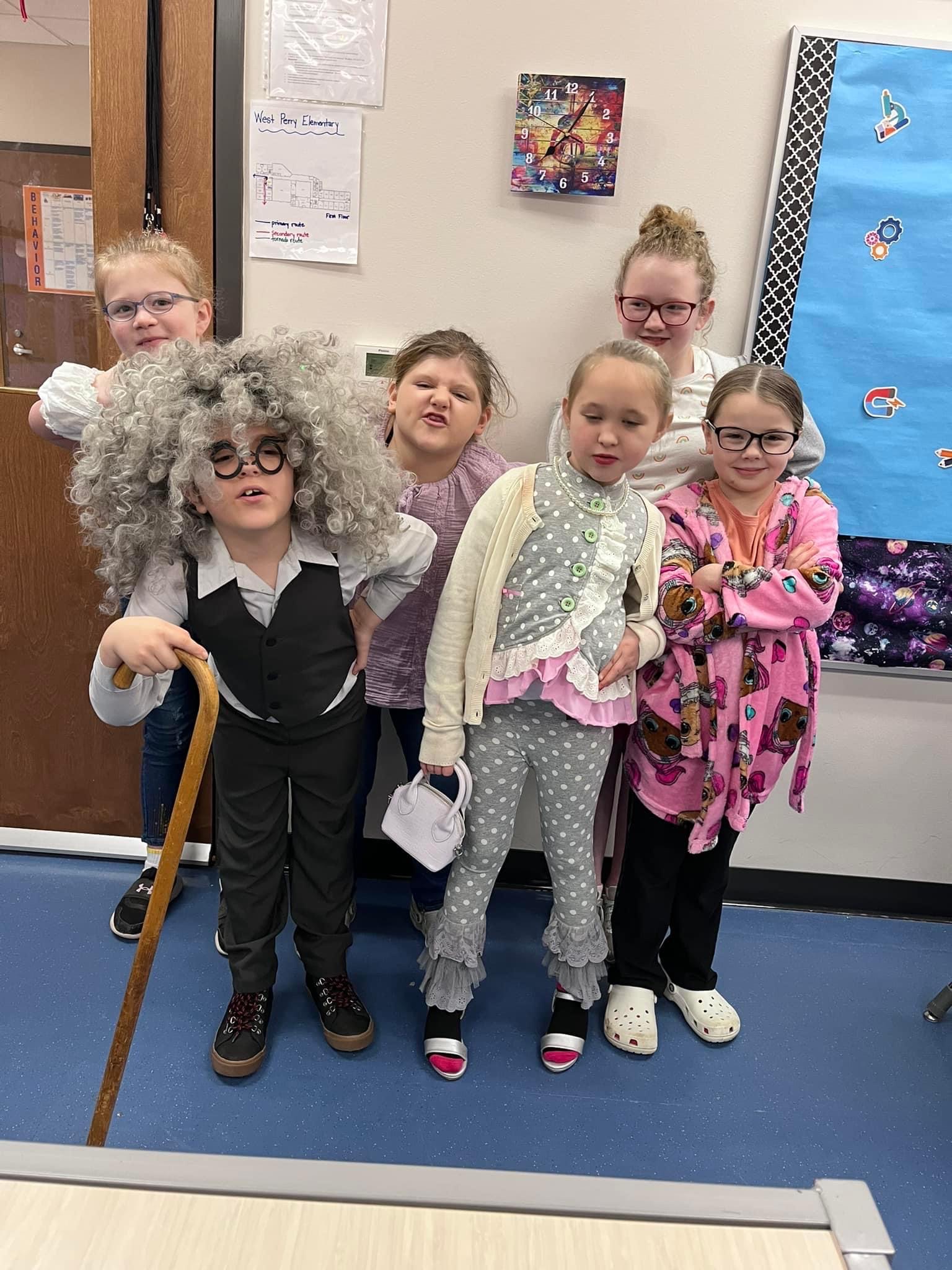 Students dressed as older people for 100th day