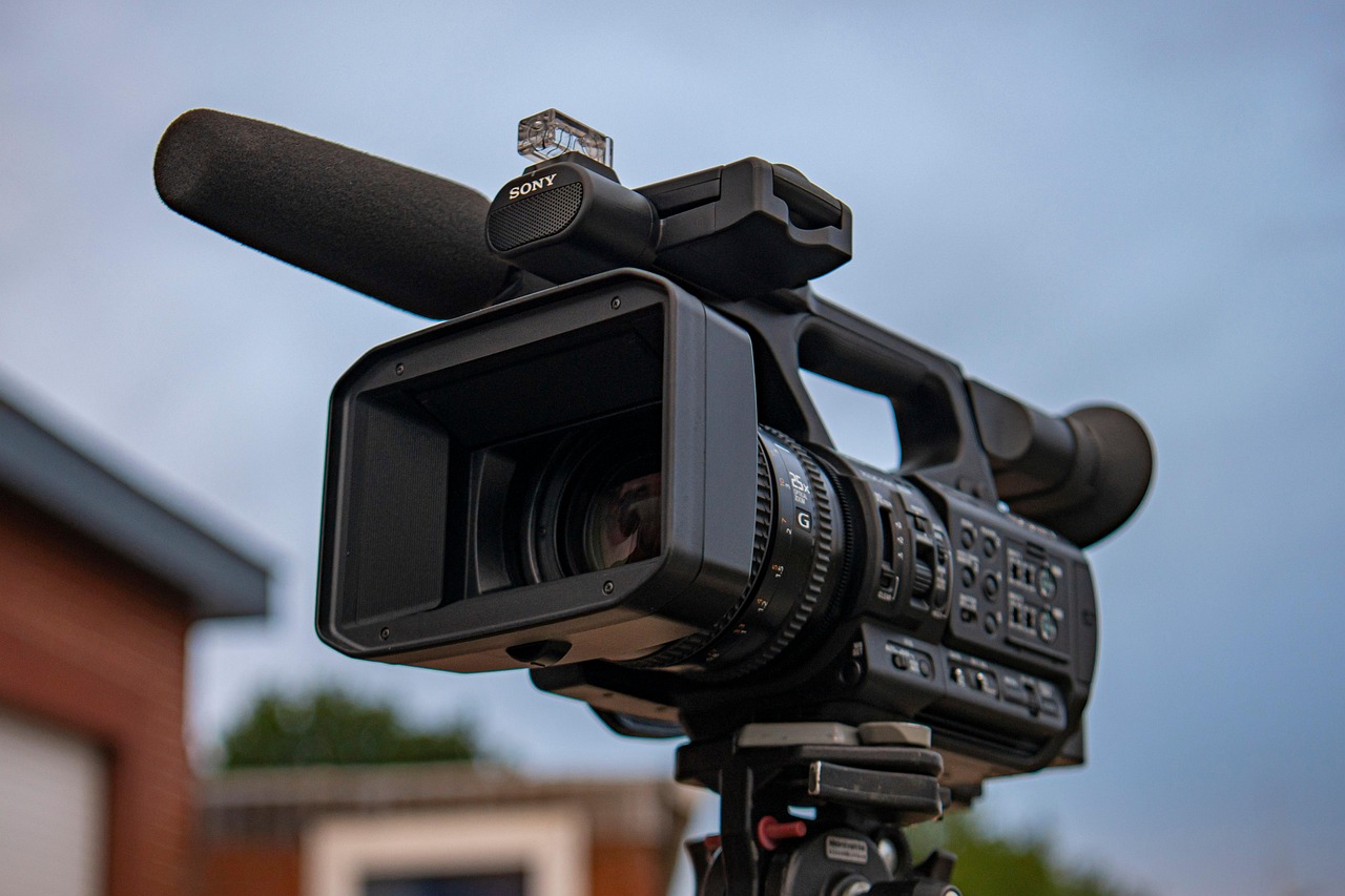 A video camera on a stand facing out from the camera