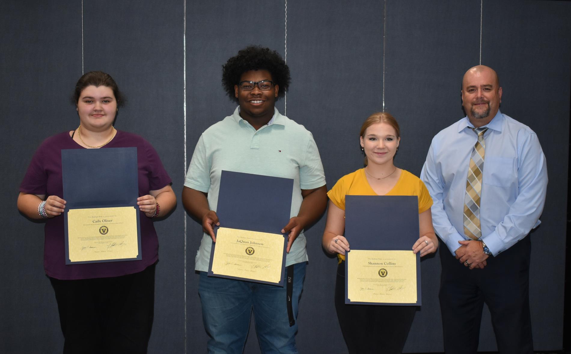 L-R Caily Oliver, JaQuan Johnson, Shannon Collins, & VHS Principal Bruce Mulkey