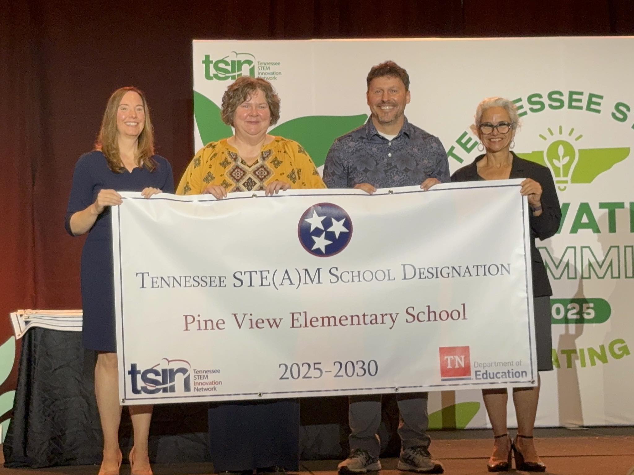 STE(A)M Banner with Mrs. Spicer and Mr. Gibson
