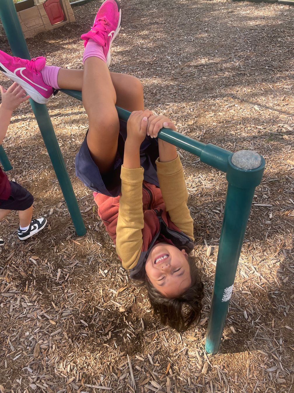 girl on monkey bars