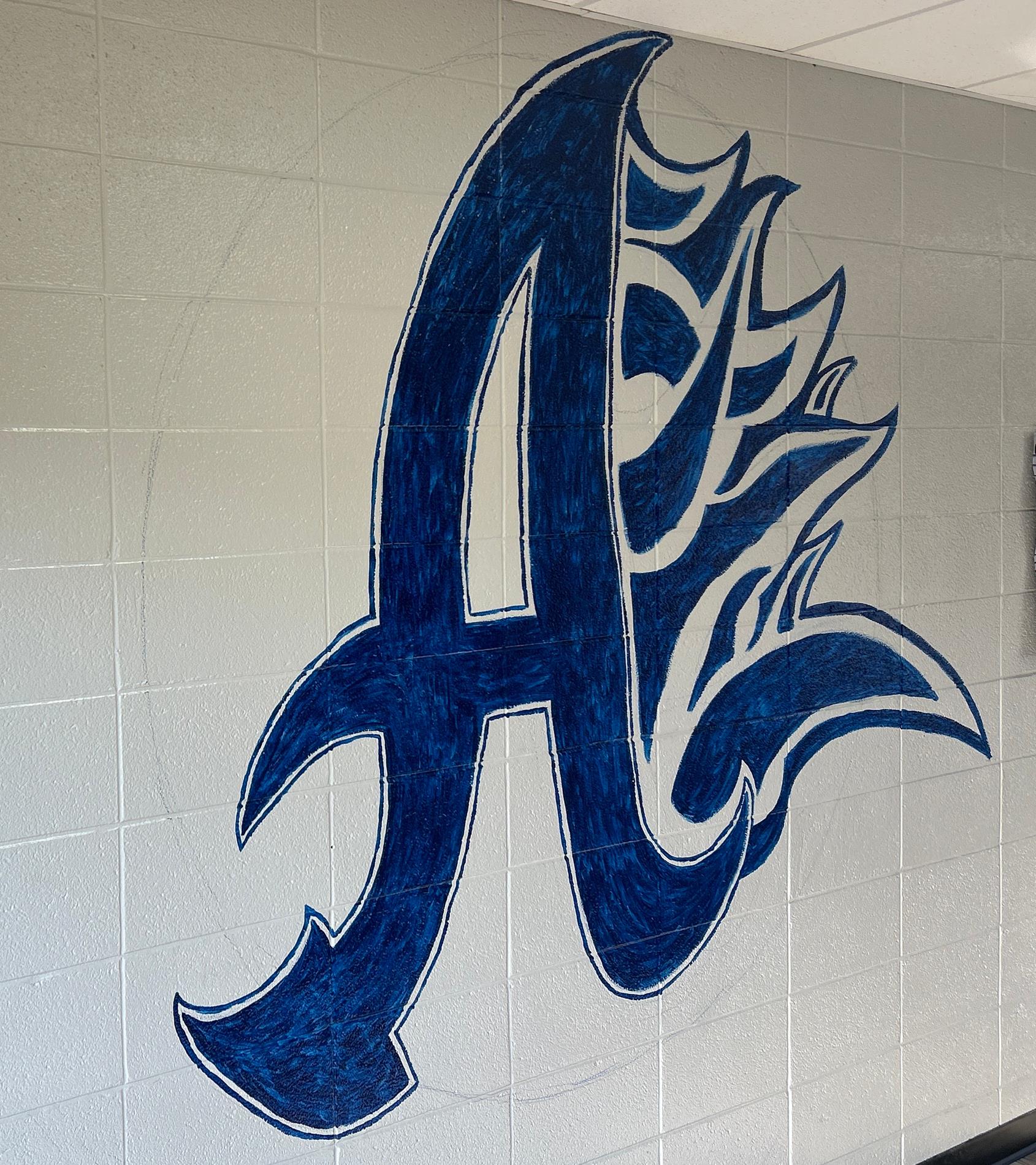 "A" mural on wall