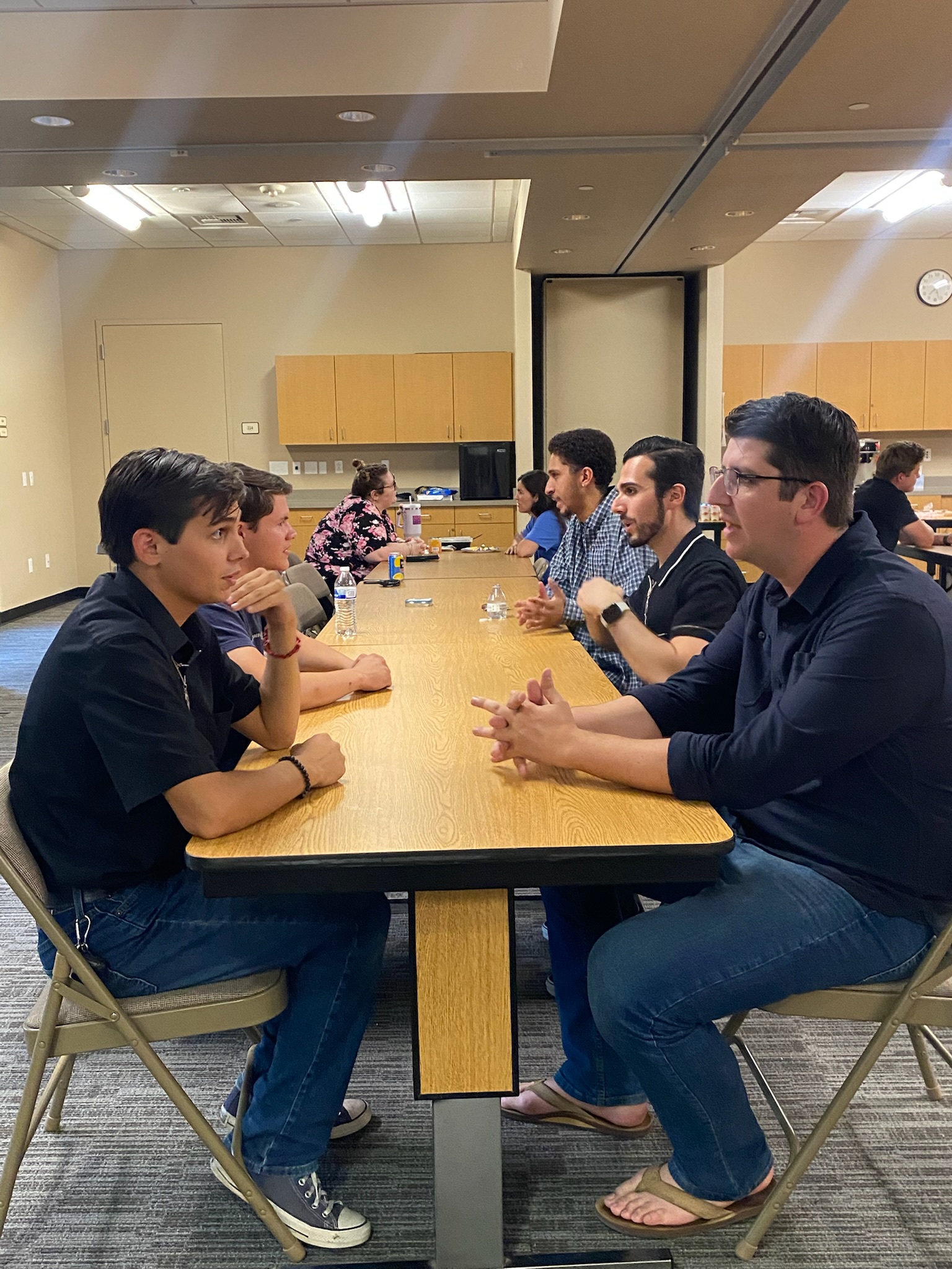 Young adults talk to each other about their views on faith-based questions