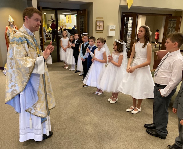 Fr. Patrick with First Communicants