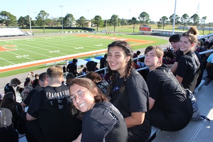 band in the stands watching game